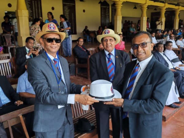 Presenting the College Hat to Principal